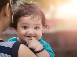 Babies who cannot speak may still benefit from a second language. Some education experts say children who learn more than one language before kindergarten have an easier time understanding math concepts, developing thinking skills; using logic; focusing, remembering, and making decisions. And the earlier they start, the better. That's according to a study done by Associate Professor Maria Arredondo at the University of Texas at Austin. Her findings reveal how bilingual infants aged between 6 and 10 months old think and learn differently than those exposed to only one language. Arredondo conducted an experiment by observing over 100 children and administering attention tests on their brains. The babies wore caps with wires, and she ensured they felt comfortable throughout the process by singing songs and sharing toys. The tasks measured how the babies learn, their inhibitory control, memory, and attention, and compared the brain activity of bilinguals and monolinguals. Her results, published in 2022, show that bilingual babies showed different neural activity than monolingual babies. This suggests that early language exposure can alter a baby's brain development and may even impact non-linguistic cognitive functions during the first year of life. Does Early Childhood Bilingualism Benefit The Brain? Bilingualism has been controversial for many years, with some people opposed to it while others champion its benefits. There has been a lot of conflicting information and myths about raising children in bilingual homes, to the extent that some pediatricians advise against exposing children to two languages. In essence, bilingual individuals divide their time between two languages and need to learn twice as many words and phrases as a child who only knows one language. The acquisition and proficiency levels of each language can vary for bilingual learners. Arredondo's study suggests bilingual children can differentiate languages before their first words. This skill helps to strengthen the part of the brain responsible for managing behavior and planning. Bilingual children performed tasks at the same level as monolinguals but used a different part of their brain, even when doing a non-language-related errand. “Bilinguals were engaging their left frontal cortex to a much greater extent than the monolinguals,” Arrendondo explained on the Standford Psychology Podcast. “[The monolinguals] were engaging the right frontal region. Some were engaging the left frontal region but not to the same extent as the bilinguals.” Similarly, Arrendondo noticed from her research that while bilinguals don't necessarily perform tasks better than monolinguals, she saw some surprising benefits. “The bilingual babies [6-10 months] are showing better developmental progression than the monolinguals,” Arrendondo said. “Monolinguals and bilinguals are improving with age, but the bilinguals are showing faster exertion of it.” While at six months, both monolinguals and bilinguals engaged two regions, or “channels” of the brain, but by ten months, the hidden superpower of the bilingual brain became apparent. “The bilinguals were engaging more channels than the monolinguals, I think they engaged eight channels, and the monolinguals engaged four channels,” Arrendondo explained on the podcast. “There is more activity emerging in the bilinguals than the monolinguals, and it correlated with performance; so better performance at six months was also correlated with more activity. It's beginning to show that the bilingual brain is adapting very early on, and it's just showing the neuroplasticity of the bilingual brain.” When she ran correlations with the school-aged children, she would see that this greater activity was related to better language proficiency. Bilinguals Think and Learn Differently Bilingual children have a special ability to mix words from two different languages when speaking. This is known as code-mixing, and it can often appear as though the child is confused; however, research suggests that it may indicate bilinguals' ingenuity. In some language communities, this type of code-mixing is common among adults, and children copy what they hear. Furthermore, code-mixing is also a way for bilinguals to quickly use words from the language they are more familiar with if they cannot easily find the right word in another language. Therefore, it is important to understand that this behavior does not necessarily indicate confusion but rather a common adaptation of speaking two languages. It's worth noting that the bilingual babies who experienced the most significant rise in brain activity in the left frontal region were also those who were exposed to higher levels of “code-switching” between multiple languages at home and were more successful in accomplishing the task according to Arredondo's findings. This suggests that code-switching between languages may help sharpen bilinguals' attention and boost learning. “These papers show that bilinguals' brains and ability in attention are adapting to their environment and improving over time,” Arredondo told The University of Texas at Austin. “It's possible this code-switching environment is making them better at learning, but we don't fully know that from this data. It's all correlational.” Is It Better To Start Learning a Language Earlier? With her findings, Arredondo hopes to encourage more parents to introduce a second language early on. But is earlier really better? “It's a question the field is still trying to understand. There are a lot of research studies showing that executive function abilities will support academic achievement. We know that better executive function will lead to better reading and math abilities,” Arredodo told the podcast. “We do know that when you are a bilingual child, you are more sensitive to the linguistic features of the language, which is related to academic abilities as well.” According to the National Library of Medicine, those who are exposed to two languages from birth tend to have better accents, more extensive vocabularies, and better grammar proficiency than sequential bilinguals. Additionally, they have a higher ability to process language in real time. For example, those who learn Spanish and English from birth are much more adept at using grammatical gender than those who study Spanish as their second language when they get older. Arredondo believes that bilingualism isn't just beneficial for academic performance but developing critical social skills. Research has revealed that being immersed in multiple cultures can increase awareness of others' emotions and social behaviors related to better social abilities. Learning two languages early on could provide children with a valuable tool for navigating social interactions with others. Although language learning abilities decrease as one gets older, it is still possible to learn a new language no matter how old you are. By using the correct methods and committing to it, anyone can become a skilled bilingual, regardless of age.