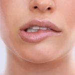 Biting Lip: Causes, Consequences, and How to Stop biting lip