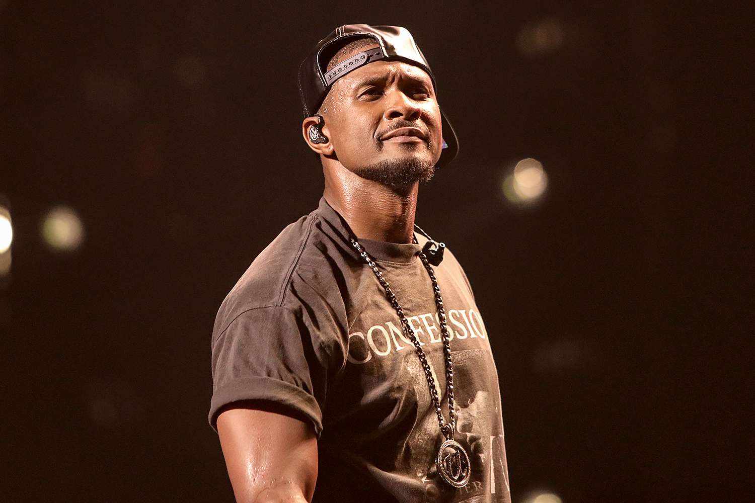 Usher Postpones